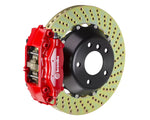 A front view of Brembo GT Rear Big Brake Kit 345x28 2-Piece 4-Piston Drilled Rotors for Toyota Supra 1993-1998 with red calipers with white background