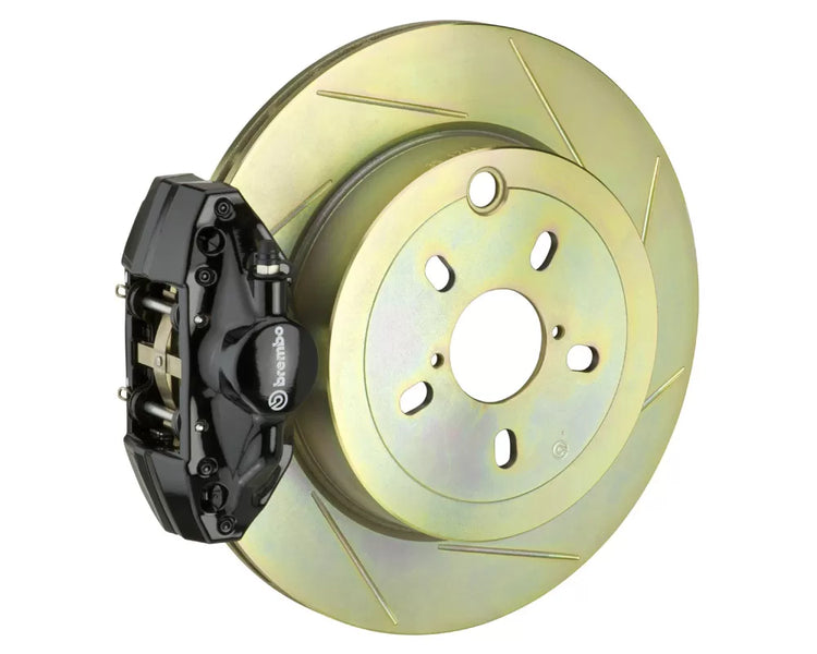 A front view of Brembo GT Rear Big Brake Kit 316x20 1-Piece 2-Piston Slotted Rotors for Subaru Impreza / WRX 2002-2007 with black caliper with white background