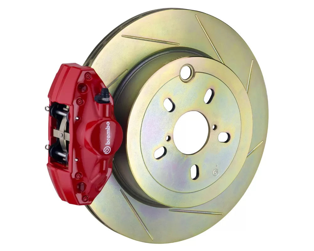 A front view of Brembo GT Rear Big Brake Kit 316x20 1-Piece 2-Piston Slotted Rotors for Subaru Legacy / WRX 2010-2022 with red caliper with white background