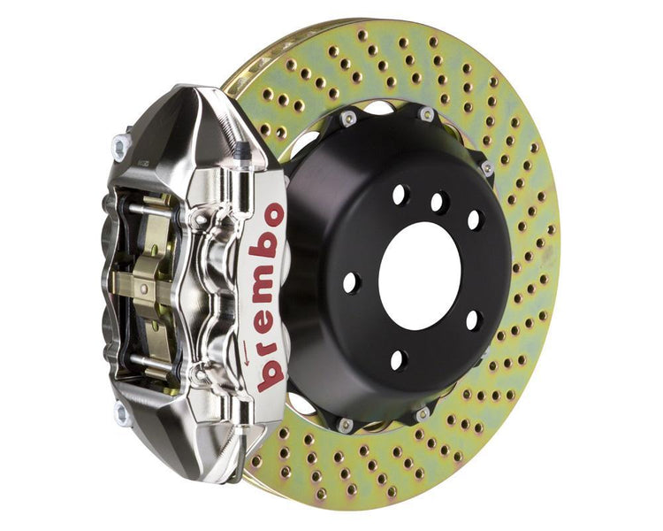 A front view of Brembo GT-R Rear Big Brake Kit 345x28 2-Piece 4-Piston Drilled Rotors for Porsche 993 C4S / Turbo with a white background