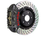 A front view of Brembo GT-S Rear Big Brake Kit 345x28 2-Piece 4-Piston Drilled Rotors for Porsche 993 C2 / C4 with white background