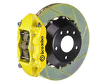A front view of Brembo GT Rear Big Brake Kit 345x28 2-Piece 4-Piston Slotted Rotors for Porsche 993 C4S / Turbo in yellow caliper with white background