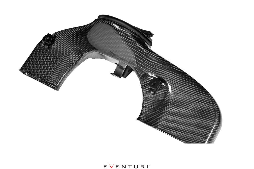 Curved carbon fiber intake tube with MAF sensor mount and black couplers on white background - Eventuri cold air intake for Toyota GR 86