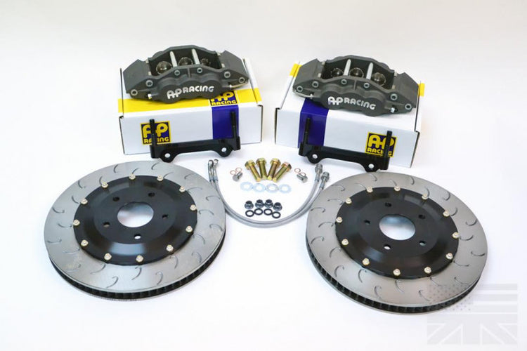 A front view of Essex Designed AP Racing Competition Brake Kit (Front CP5060/372)- S550 Ford Mustang with a white background