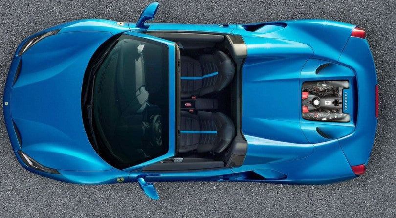 Blue Ferrari 488 Pista Spider top view with Capristo carbon fiber glass bonnet