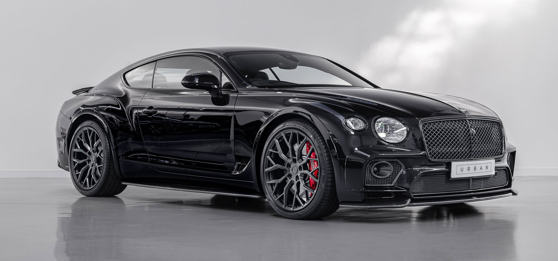 Black Urban Continental GT with carbon front bumper and splitter