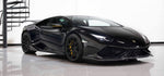 Side view of a black Lamborghini Huracan fitted with the Urban carbon aero kit