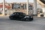 Black Rolls-Royce Ghost with the Urban carbon body program, front three-quarter view