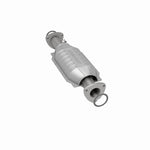MagnaFlow 4481499 carb direct-fit catalytic converter, rear three-quarter view of the turntable spin