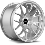 Silver alloy wheel with multi-spoke design and black center cap, shown at three-quarter angle on white background - APEX Wheels wheel for 19x11 ET44 5x120 - Race Silver