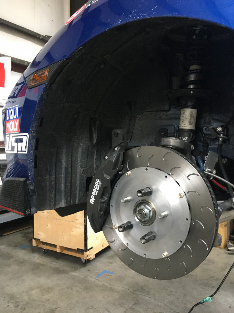 A close up view of Honda Civic Type R's wheel fitted with AP Racing by Essex Radi-CAL ENP Competition Brake Kit (Front CP9660/355mm)