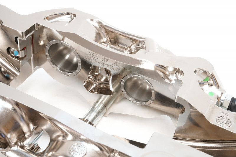 A close up view of the CP9450 of the AP Racing by Essex Radi-CAL ENP Competition Brake Kit (Rear CP9450/365mm)- Porsche 992.1 C2S/C4S with white background