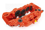 A top view of a red caliper of the AP Racing by Essex Road Brake Kit (Front 9562/380mm)- F87 BMW M2 & M2 Competition, F80 M3, F82 M4 with a white background