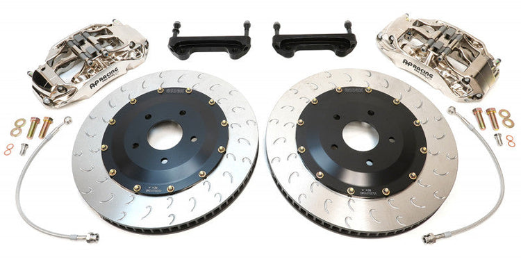 A top view of AP Racing by Essex Radi-CAL ENP Competition Brake Kit (Front 9661/390mm)- Porsche 992 Turbo / Turbo S with a white background