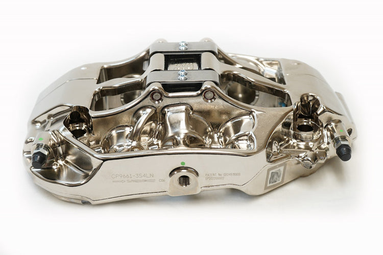 A front view of 9661 of the AP Racing by Essex Radi-CAL ENP Competition Brake Kit (Front 9661/394mm)- Porsche 992 GT3 with a white background