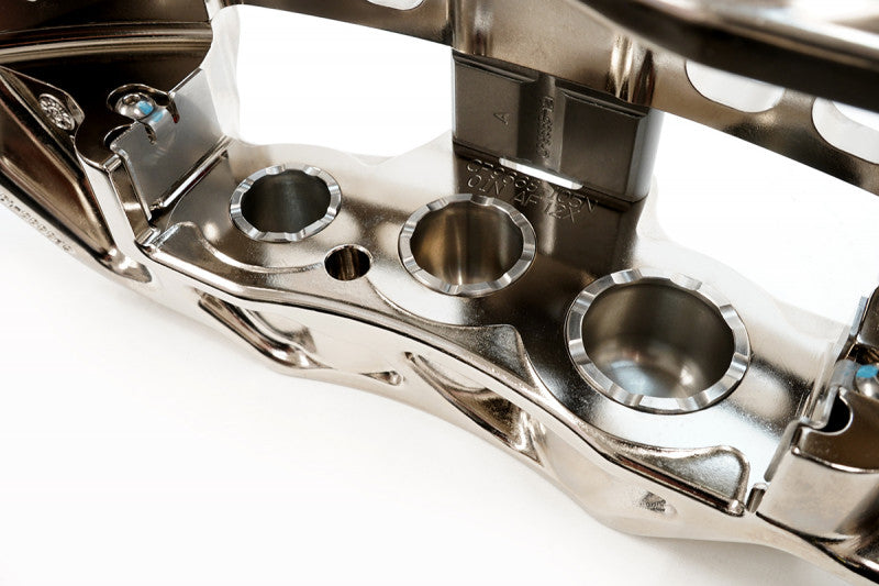 A close up view of CP9668 of the AP Racing by Essex Radi-CAL ENP Competition Brake Kit (Front CP9668/372mm) - Gen.6 Camaro, Cadillac ATS-V & CTS-V (V3) with a white background