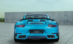 A back wide view of TECHART Tailgate Panel Matte Carbon Fiber Porsche 991.2 GT3 RS fitted on a blue car