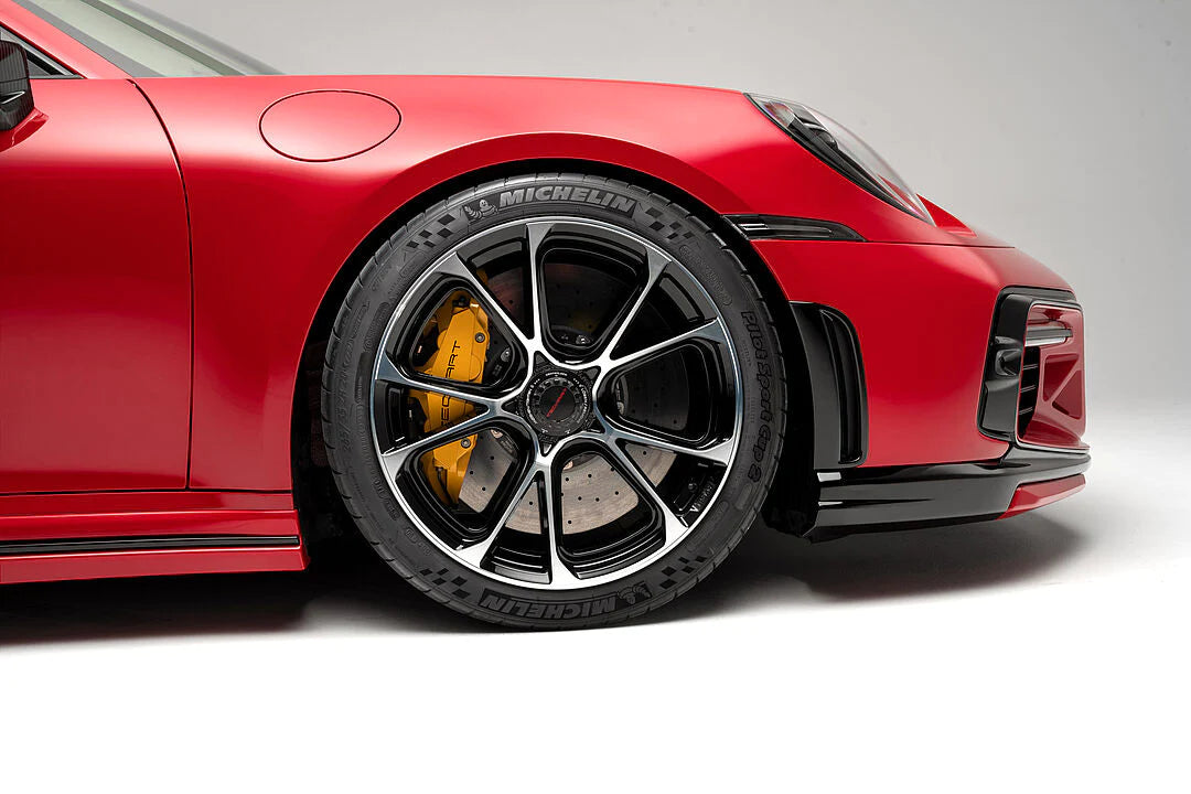 A side close up view of TECHART Front Air Outlet Grilles Porsche 992 Carrera / Targa / Turbo fitted on a red Porsche