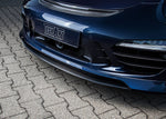 A close up view of TECHART Splitter Carbon, "glossy" for Porsche 981 / 991 / 970 Panamera as of MY14 fitted on a blue car 
