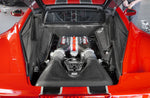 Red Ferrari 458 Speciale engine bay from above with Capristo carbon fiber lock cover