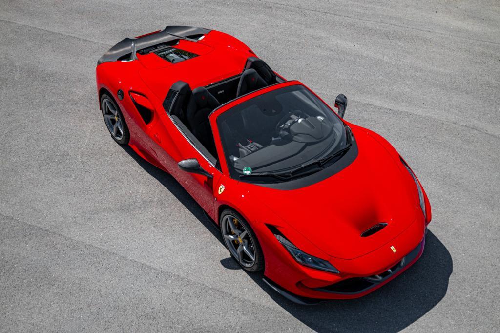 Red Ferrari F8 Spider from above with Capristo carbon front air vents
