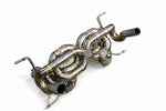 Lamborghini Huracan STO Valvetronic exhaust: stainless F1 exhaust on white with looped pipes and outlets