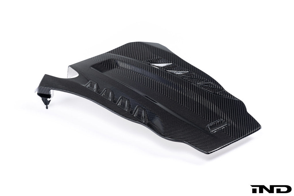 A close up view of Eventuri Black Carbon Intake System For BMW F9X X5M / X6M / G09 XM from the side