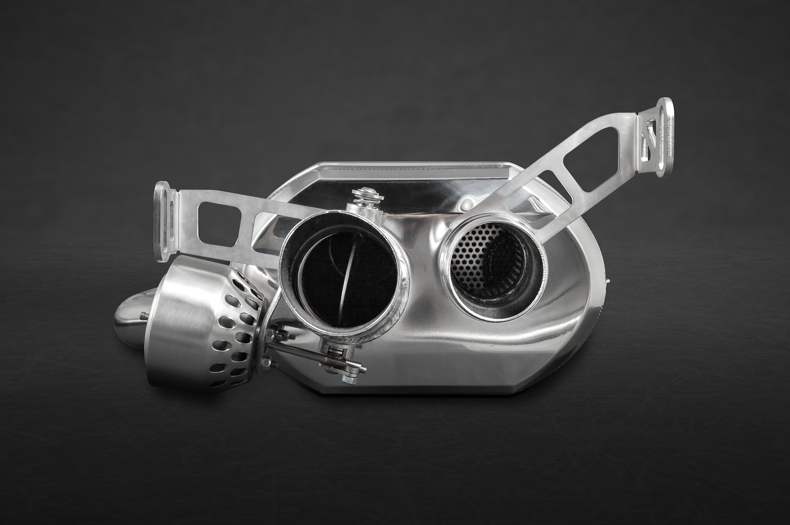 Capristo Continental GT W12 muffler outlet with valve flap and perforated outlet, end view