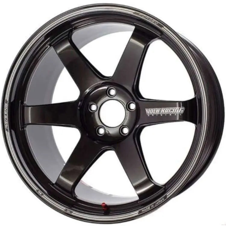 A front view of Volk Racing TE37 Ultra M-Spec Wheel 19x9.5 5x114.3 22mm Diamond Black with white background