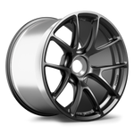Single alloy wheel with dark gray face and polished silver barrel in three-quarter view - APEX Wheels wheel for 19x12 ET46 PSCL - Satin Black