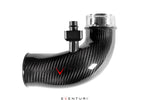 Black carbon fiber curved turbo inlet pipe with metal fittings and red V logo on clean white background - Eventuri turbo inlet for BMW F90 M5 F91 F92 F93 M8