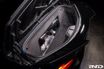 Carbon fiber intake system with curved ducts installed in vehicle front compartment area - Eventuri intake for Chevrolet Corvette Z06