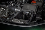 Carbon fiber air intake box with curved tubes installed in Honda Civic Type R engine bay - Eventuri air intake for Honda Civic Type R