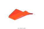 Orange powder-coated aluminum engine cover with angular geometric design isolated on white background - Eventuri carbon intake for Toyota GR Corolla