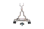 BMW G30 M550i Valvetronic exhaust: stainless valved cat-back on white with dual black tips