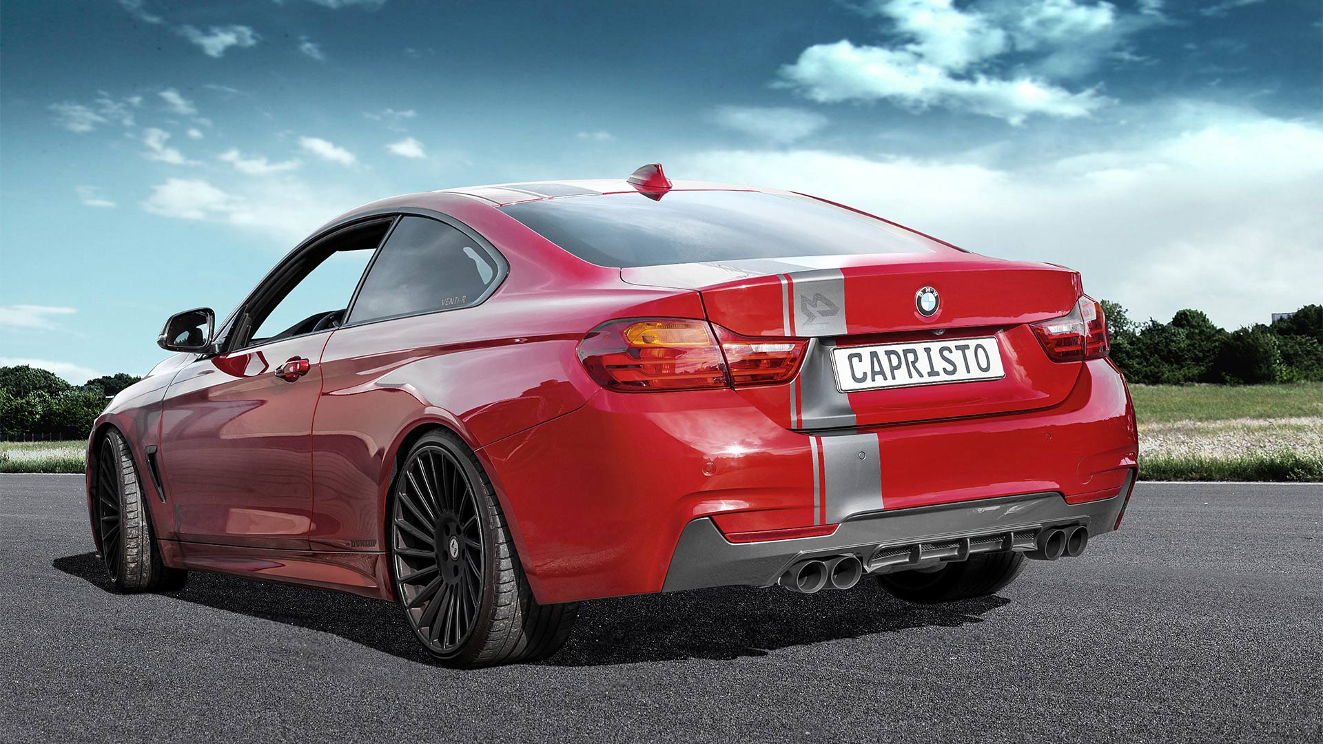 Red BMW 435i F32 rear three-quarter with Capristo rear diffuser apron