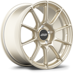 Gold finished forged wheel with ten-spoke design and black center cap on white background - APEX Wheels wheel for 18x11 ET57 5x120.65 - Motorsport Gold