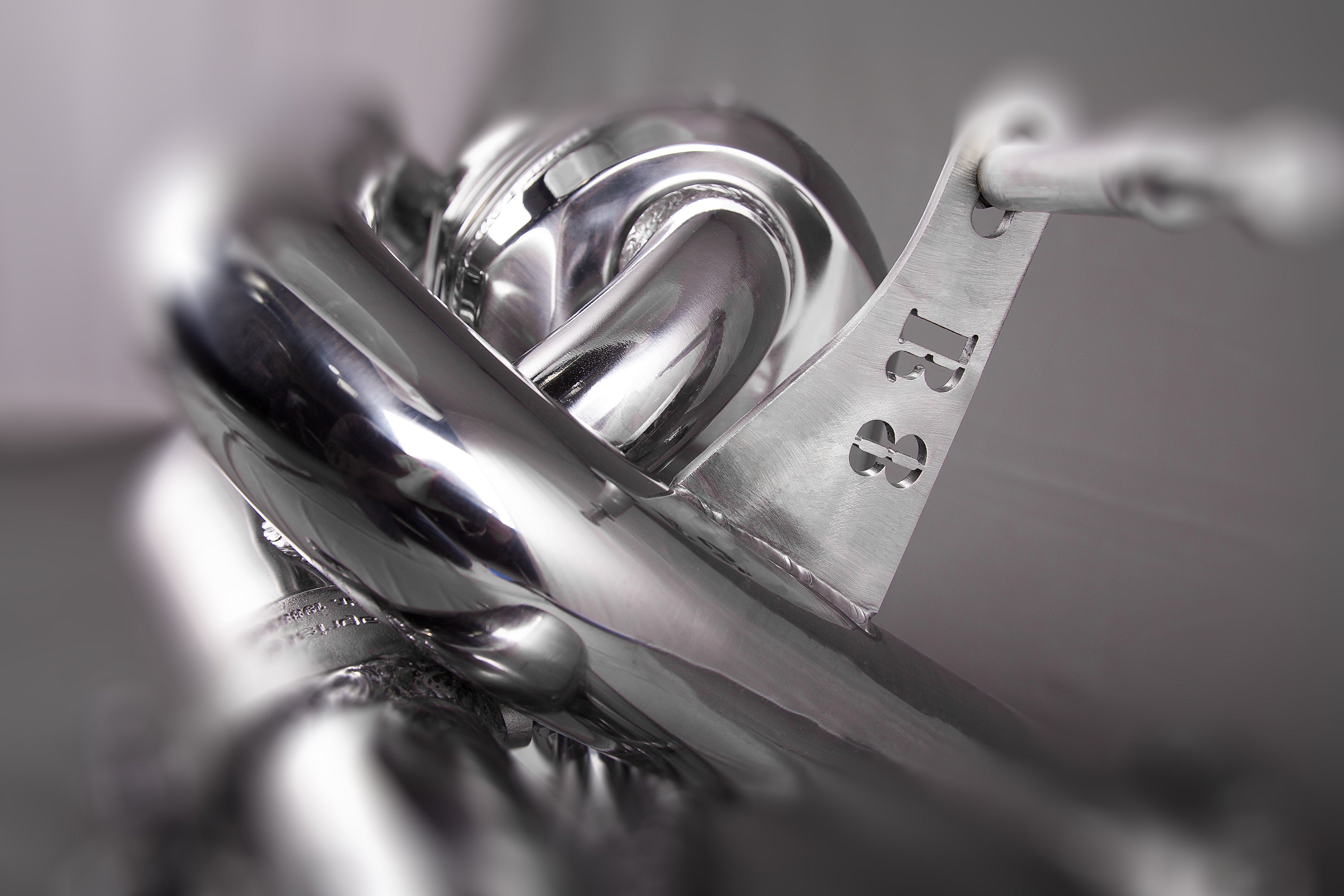 Capristo R8 GT exhaust bracket stamped R8, polished stainless
