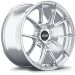 Silver alloy wheel with five-spoke design and center cap, isolated on white background at angle showing face and barrel - APEX Wheels wheel for 17x9.5 ET40 5x100 - Brushed Clear