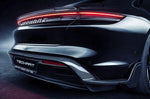 A close up view of TECHART Rear Diffuser with Fins CFRP Porsche Taycan 2019+