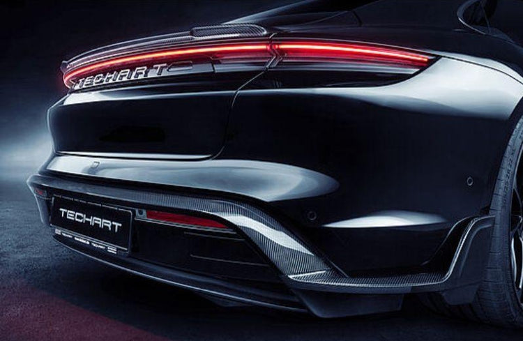 A close up view of TECHART Rear Spoiler CFRP Porsche Taycan 2019+