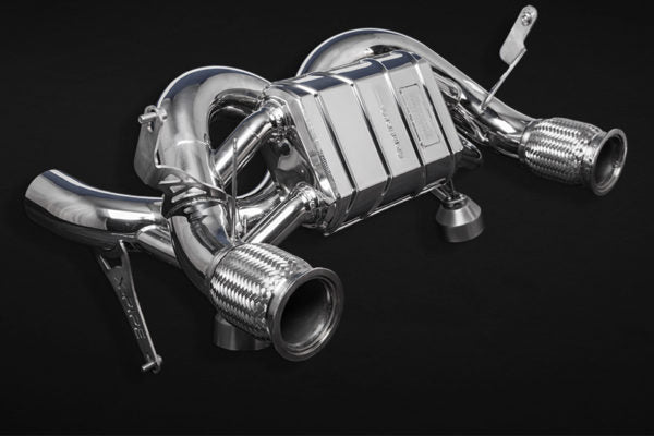 close top view of Capristo Valved X Pipe Exhaust (for OEM tips) with Heat Protection for Lamborghini Huracan Performante/EVO/STO/Tecnica 2018-2024 with black background
