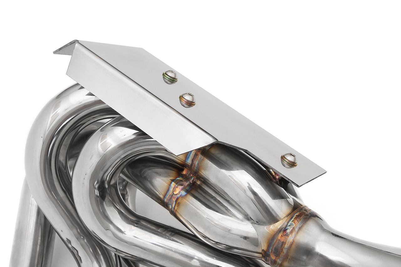 Heat shield mounting tabs on the Fabspeed Ferrari 348 sport headers