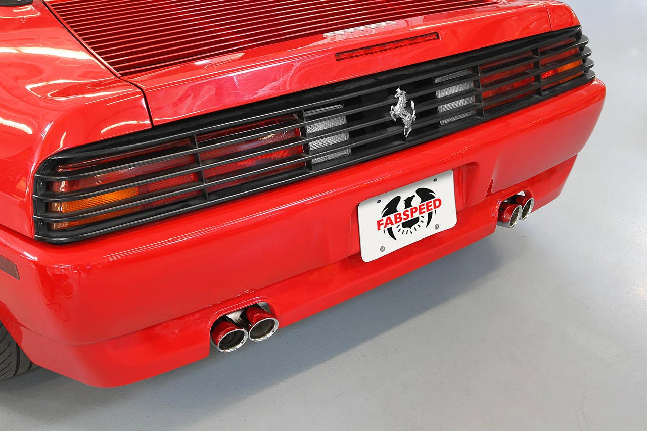 Red Ferrari 348 rear bumper with the Fabspeed exhaust tips