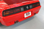 Red Ferrari 348 rear bumper with the Fabspeed exhaust tips