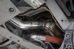 Fabspeed F12 sport cat installed beside the engine, heat shield visible