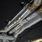 Fabspeed F12 Berlinetta X-pipe installed, angled underside view