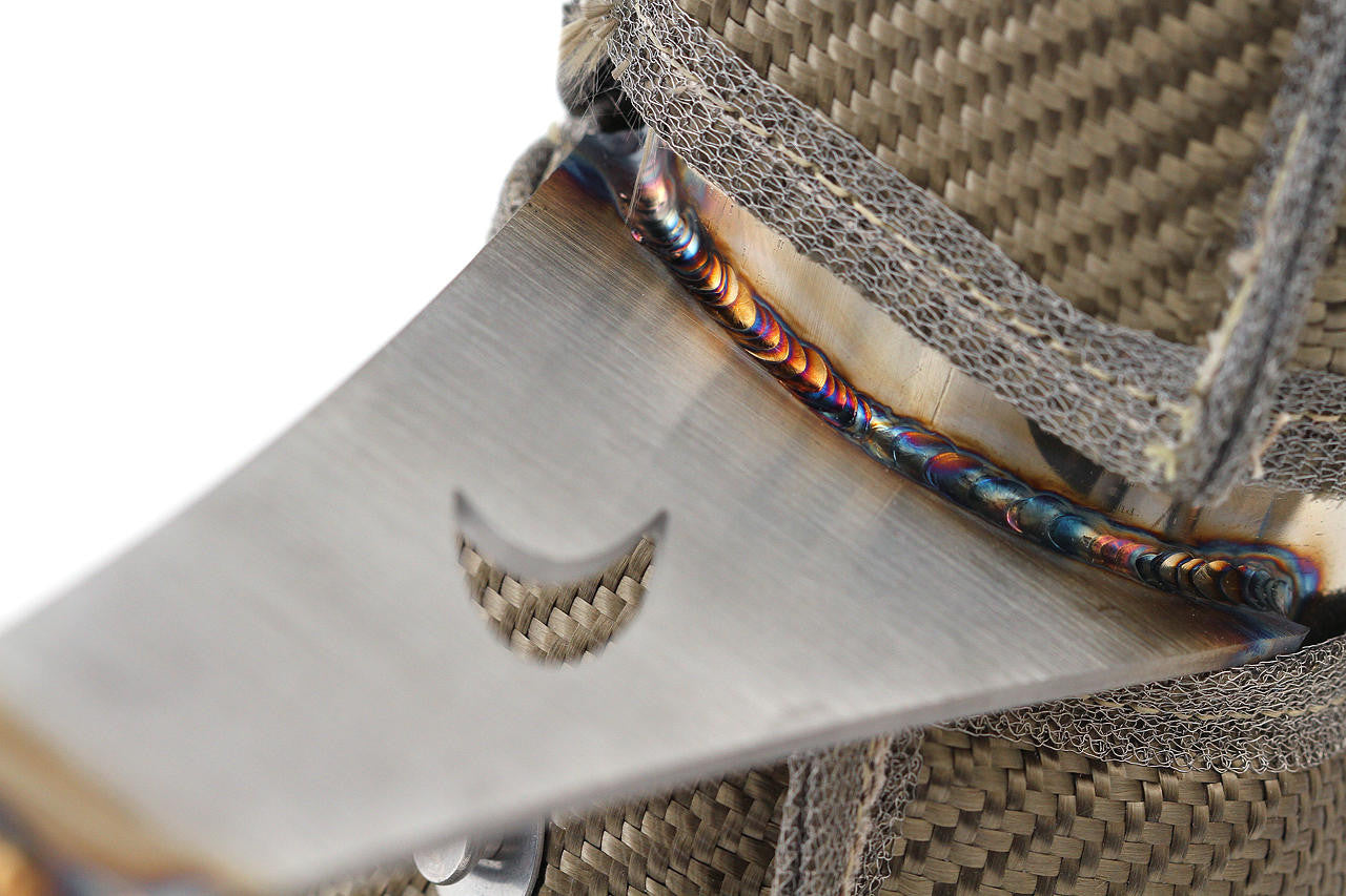 Weld and bracket detail under the heat wrap on the 570S X-pipe
