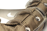 Close-up of the woven heat wrap and fastener on the 570S X-pipe