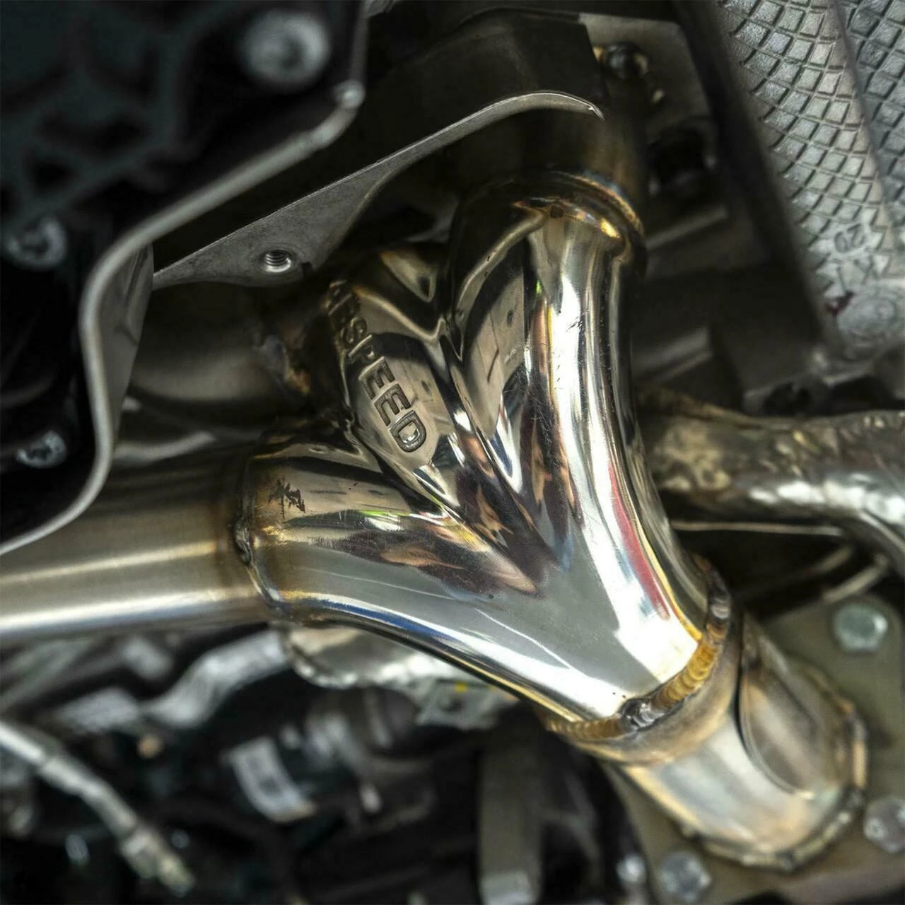 Fabspeed 992 Carrera sport header installed, close view